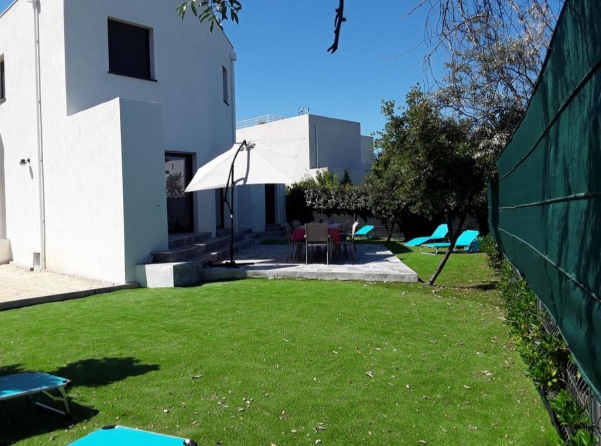 Villa En Bord De Plage Σετ Εξωτερικό φωτογραφία